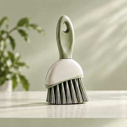 Sage green hand brush with cream head and dense bristle tufts