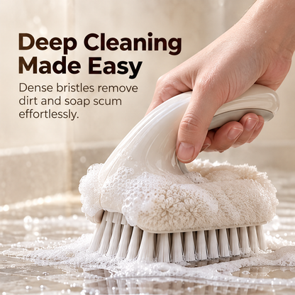 Hand holding the curved grip while scrubbing a wet surface
