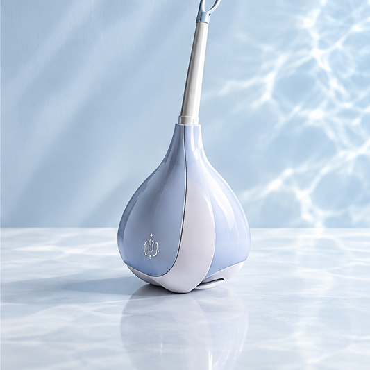 Blue-and-white toilet brush stored in a teardrop-shaped holder