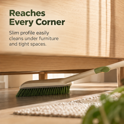 Slim broom head shown reaching beneath furniture